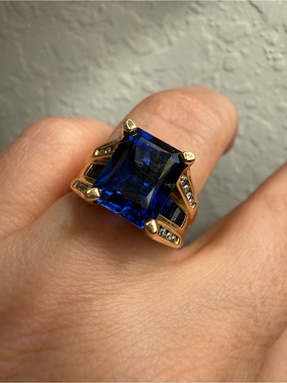 Created sapphire and yellow gold ring